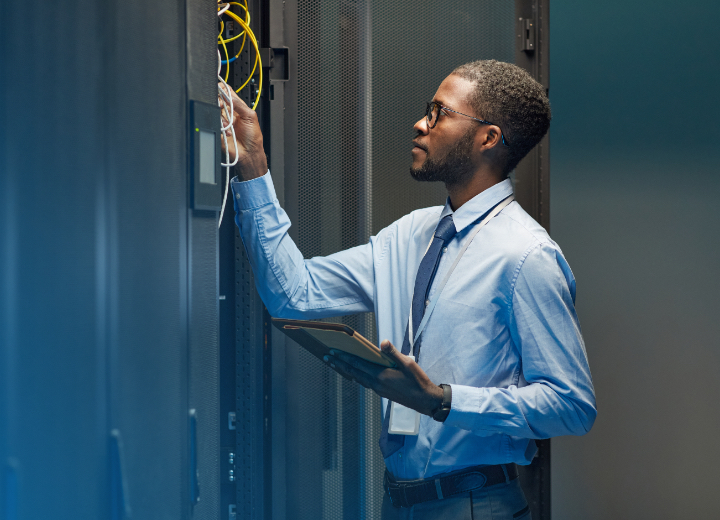 CPG Man inspecting electrical wiring