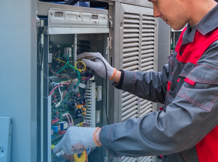 CPG Man repairing electrical equipment